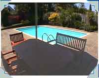 This pool was built by us in 1982. The photo in 2001. The pool is still going well, and is on the original DUNLOP liner which had a 10 year guarantee. The latest liners (since 1988) are Vynide, which carry a 20 year guarantee!