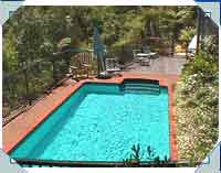 Same Pool - Differnt Angle! Check out the steep bush-clad slope beyond the pool!