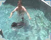 Meggie swimming in pool 