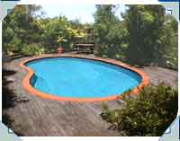 Nice, Older (built 10 yrs ago) RIO on the side of a cliff at Hillsborough. We had to winch the digger up from the Manukau Harbour beachfront. The pool is decked with TanPine, and runs Salt Water.